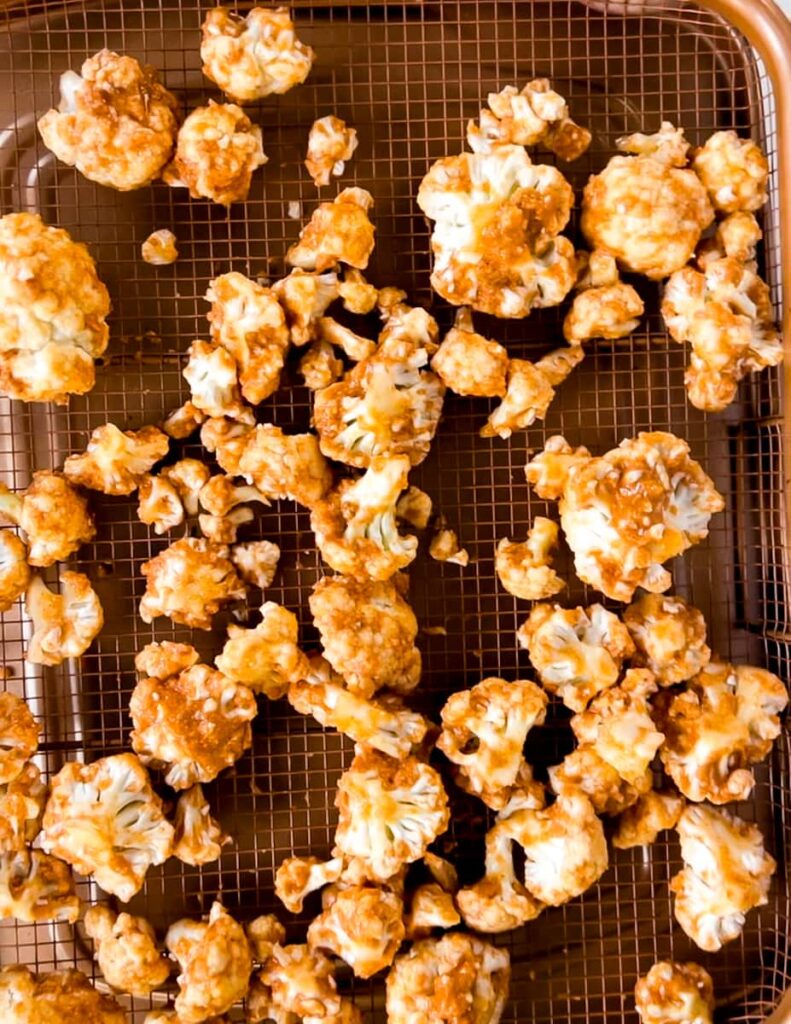 cauliflower on baking rack.