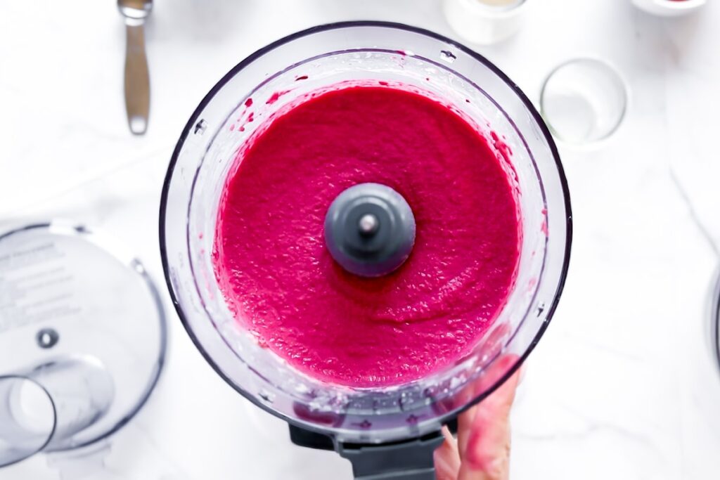 Beet hummus in the food processor.