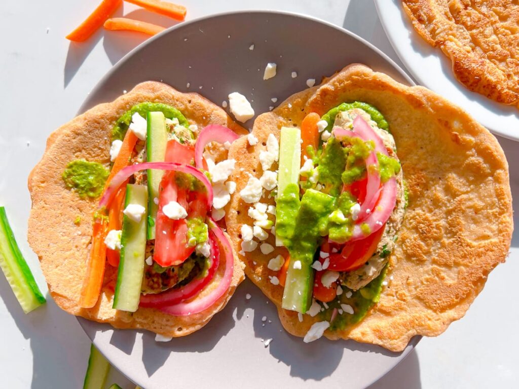 Finished lentil wraps with toppings.