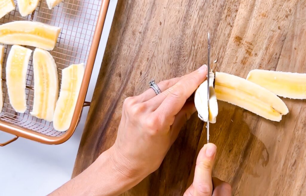 Cutting the bananas.